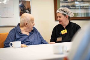 Royal Freemasons Chef Rene Horton speaks with Centennial Lodge resident