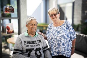 Lady and man in outdoor area of nursing home